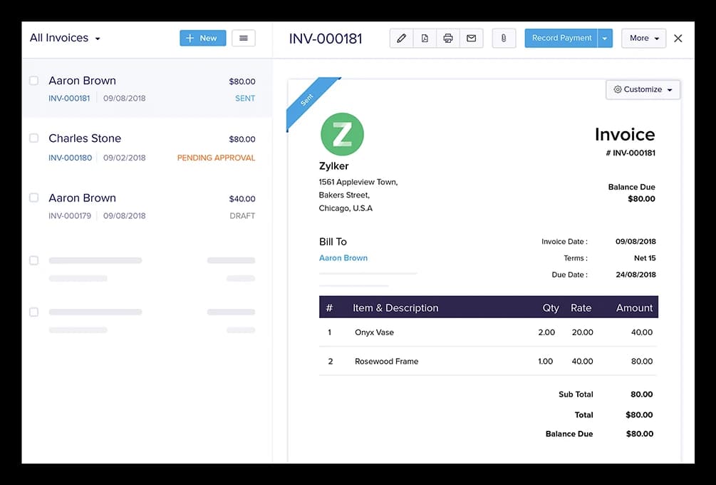 Zoho Books invoice screen displaying billed items, totals, and payment status